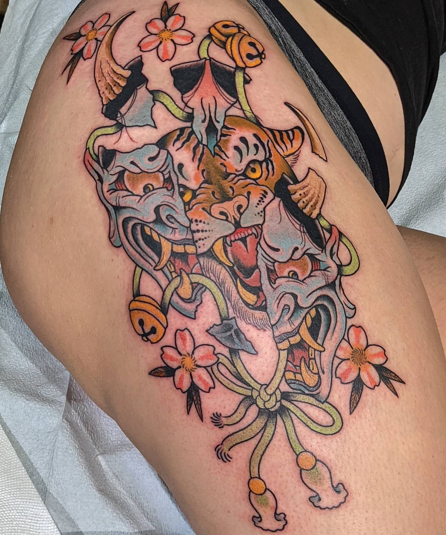 Hannya and Tiger Split Tattoo Chris Benson at Silver Ghost Tattoo in Edmonton Alberta Canada