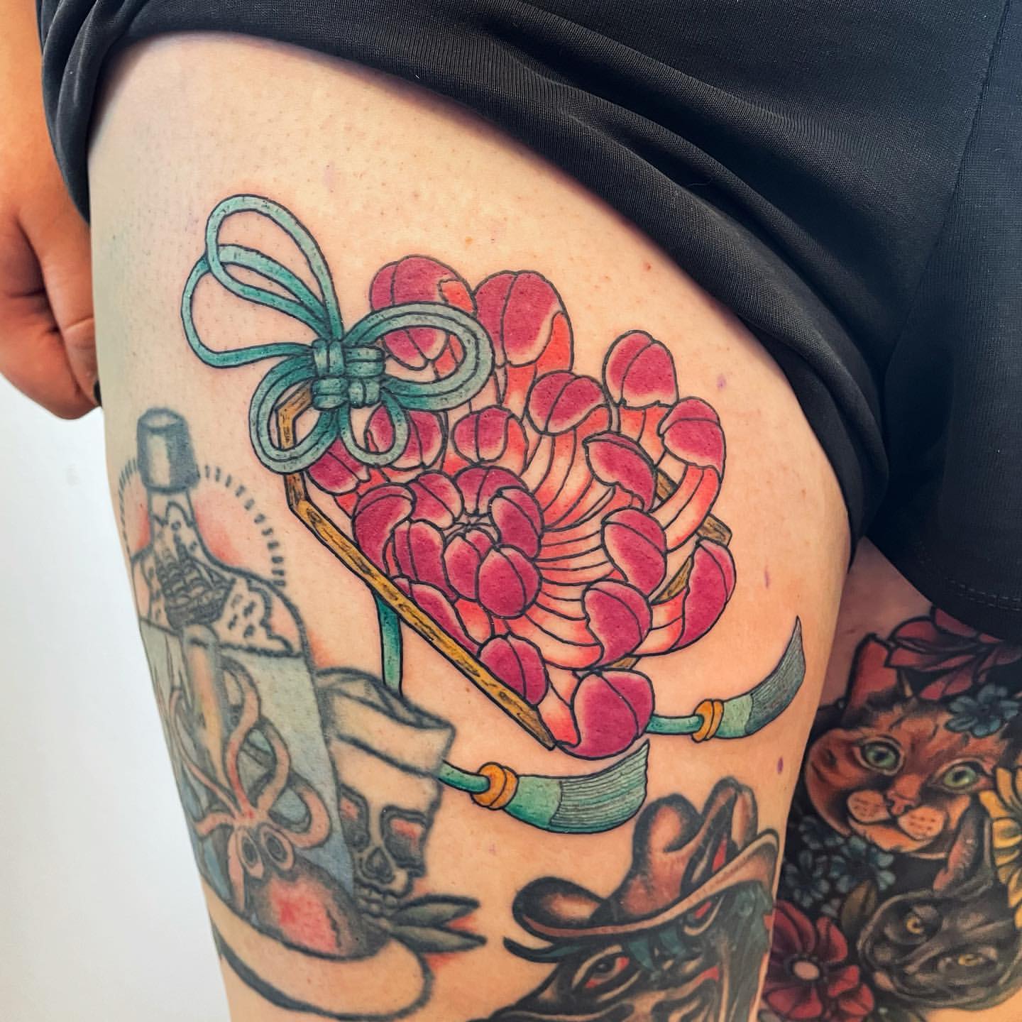Chrysanthemum Charm Tattoo by Vinny Nguyen at Crimson Empire Tattoo in Edmonton Alberta Canada