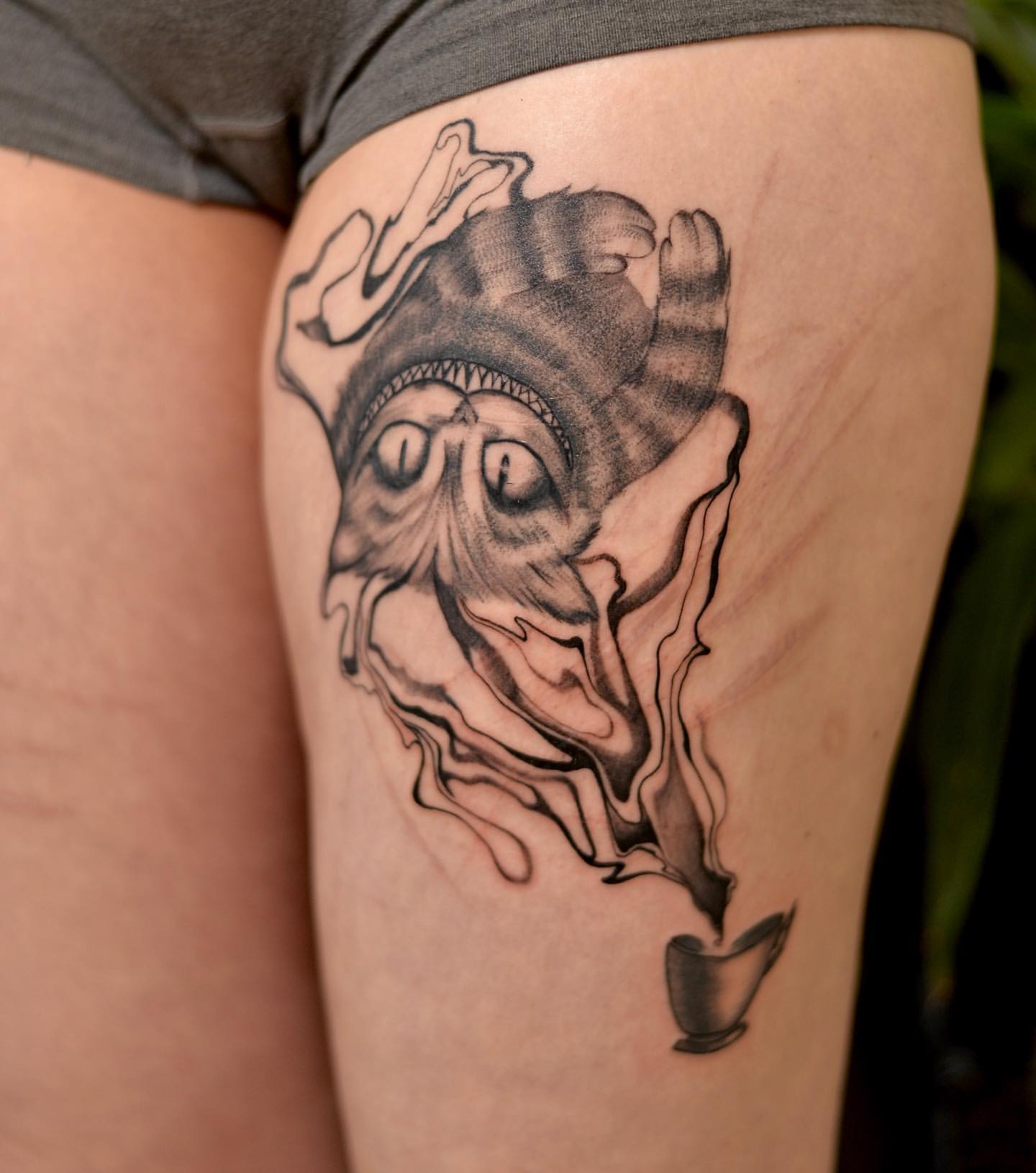 Cheshire Cat Tattoo by Anastasiya at Silver Ghost Tattoo in Edmonton Alberta Canada