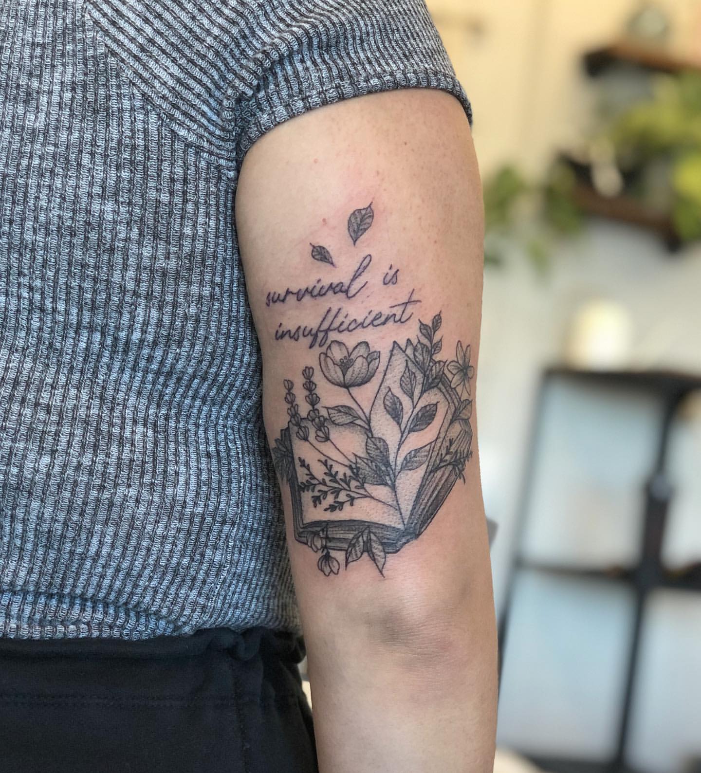 Book and Floral Tattoo by Vanessa Spezowka at Crimson Empire Tattoo in Edmonton Alberta Canada