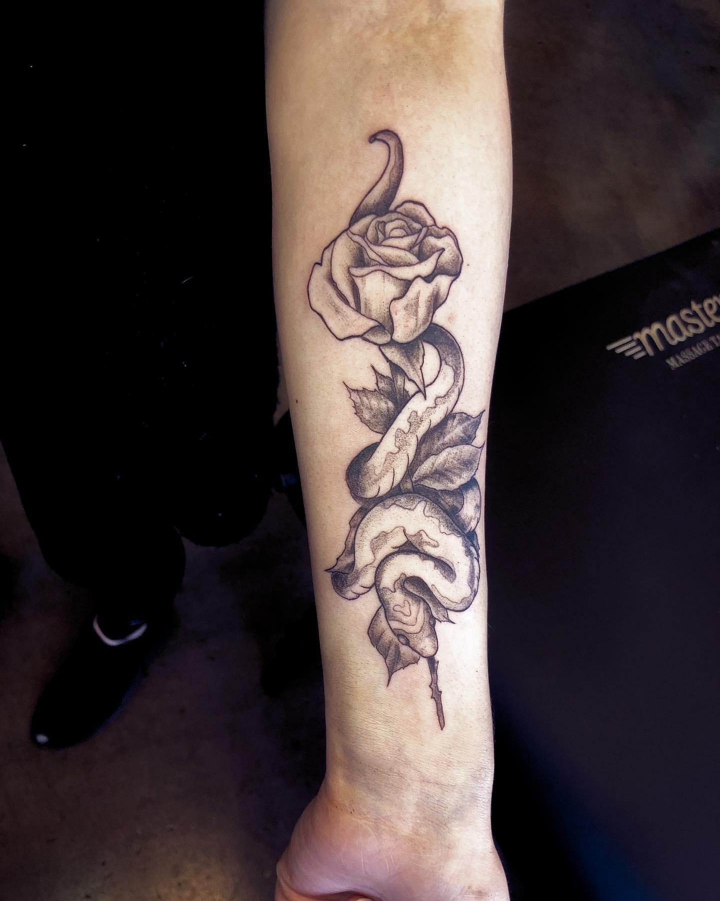 Snake and Rose Tattoo by Tony Honning at Crimson Empire Tattoo in Edmonton Alberta Canada