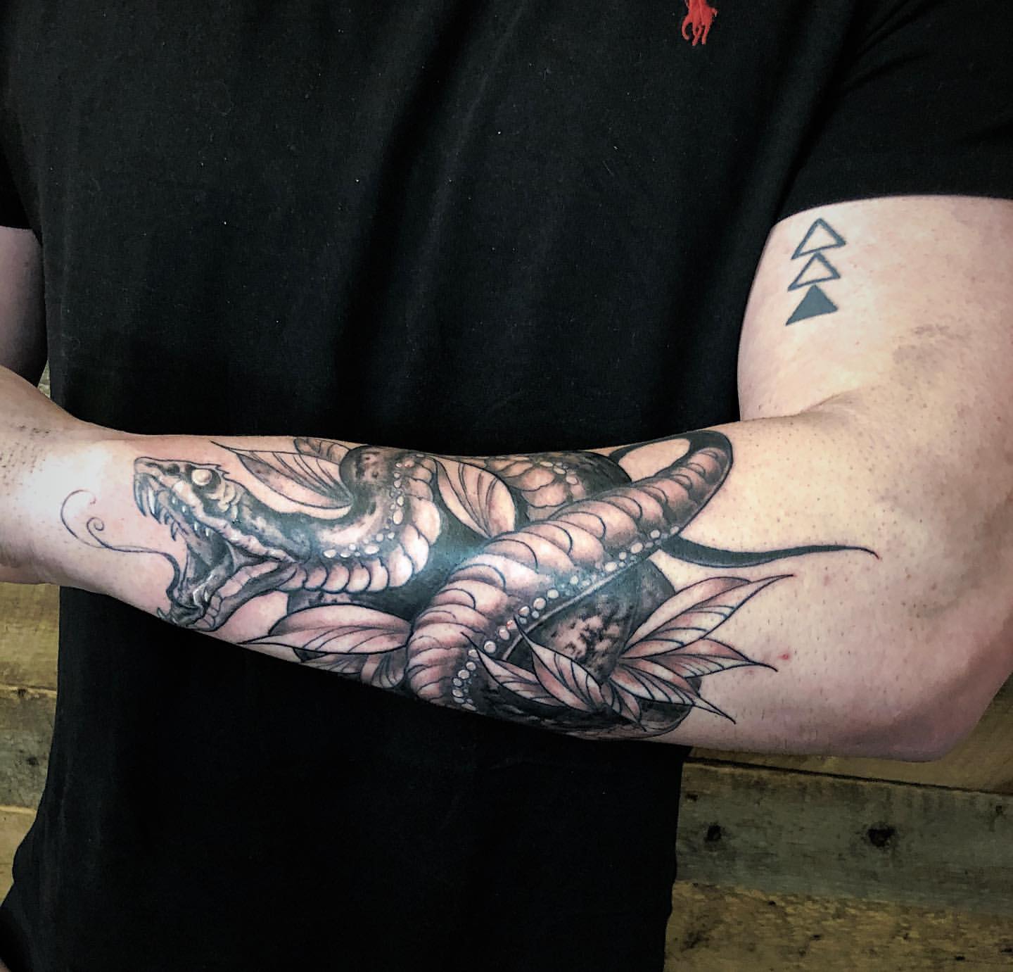 Snake Tattoo by Tony Honning at Crimson Empire Tattoo in Edmonton Alberta Canada