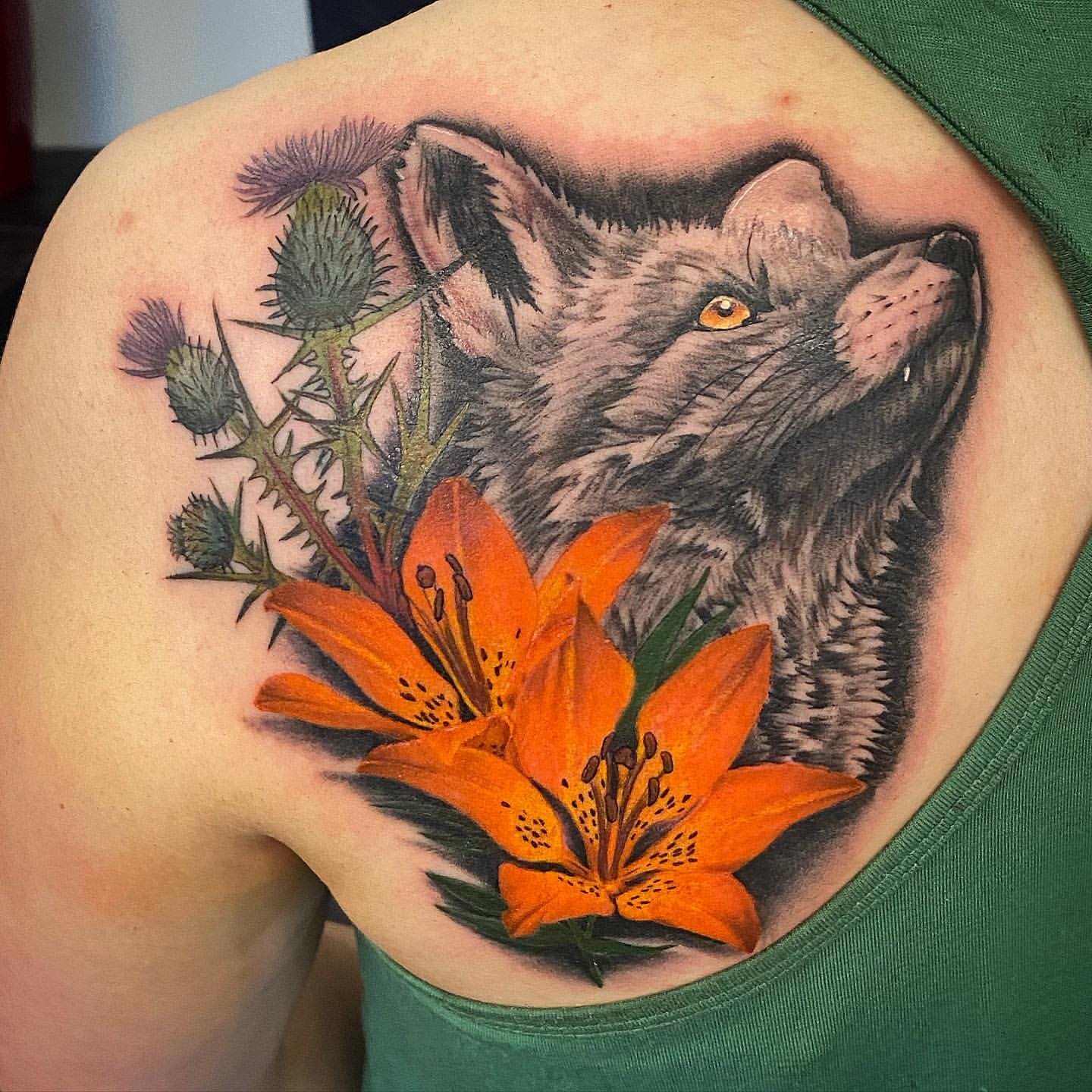 Fox and Tiger Lilly by Tattoo Dale Moostoos at Crimson Empire Tattoo in Edmonton Alberta Canada
