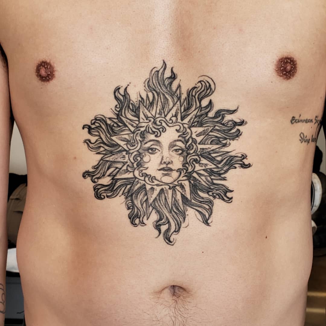 Sun Tattoo by Adrienne Alexander at Crimson Empire Tattoo in Edmonton Alberta Canada