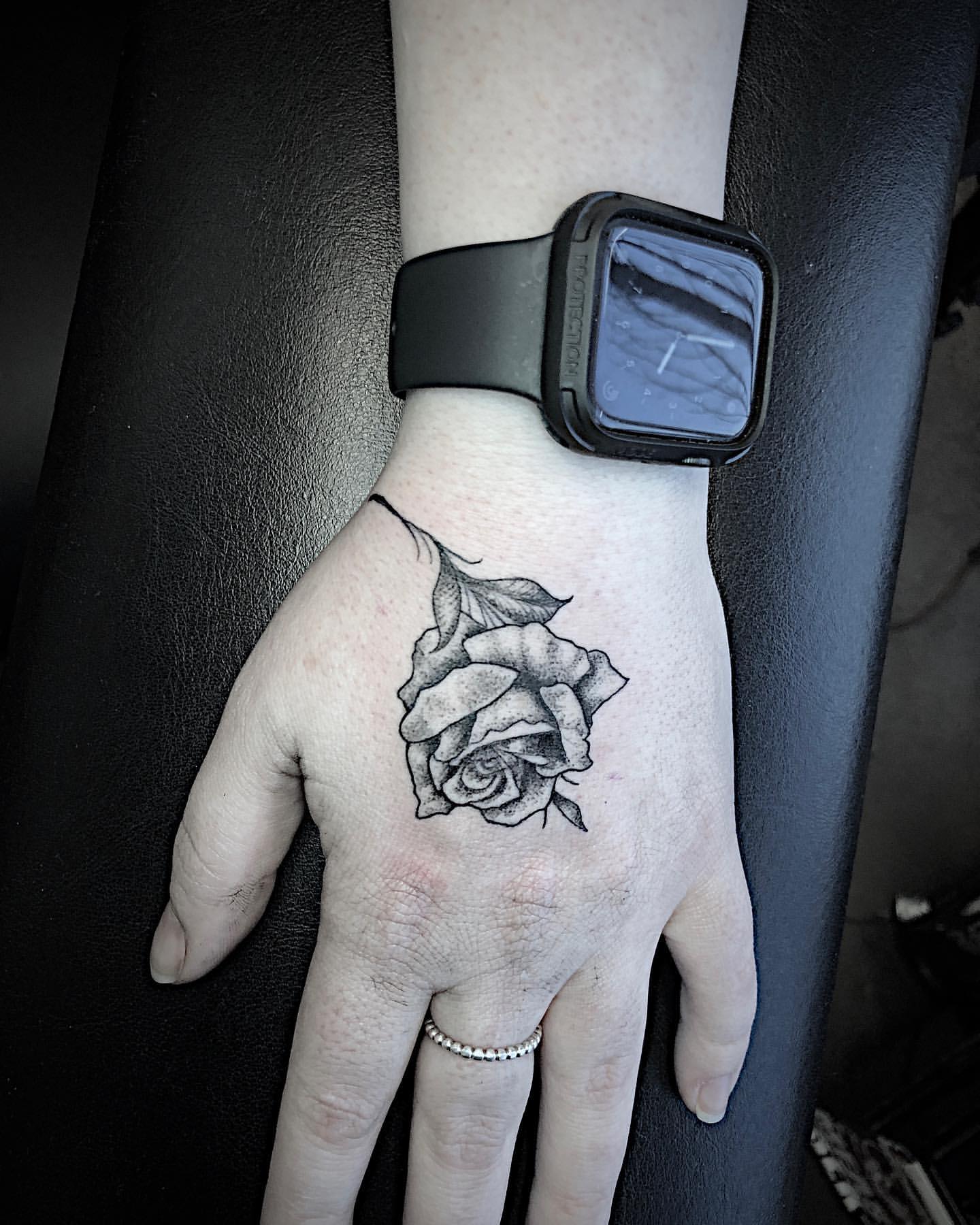 Rose Tattoo by Tony Honning at Crimson Empire Tattoo in Edmonton Alberta Canada