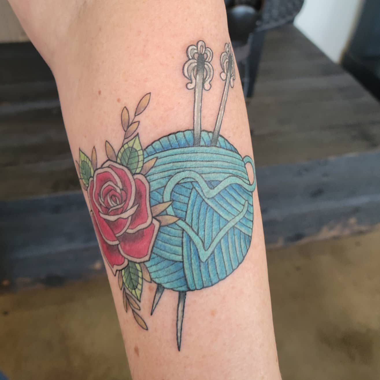 Rose and Knitting Thread Tattoo by Sheila Anderson at Crimson Empire Tattoo in Edmonton Alberta Canada