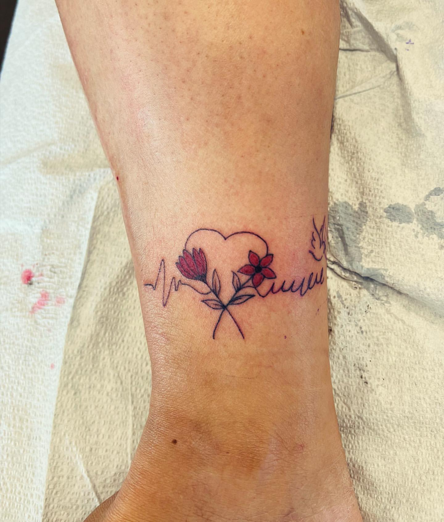 Floral Heartbeat Tattoo by Vinny Nguyen at Crimson Empire Tattoo in Edmonton Alberta Canada