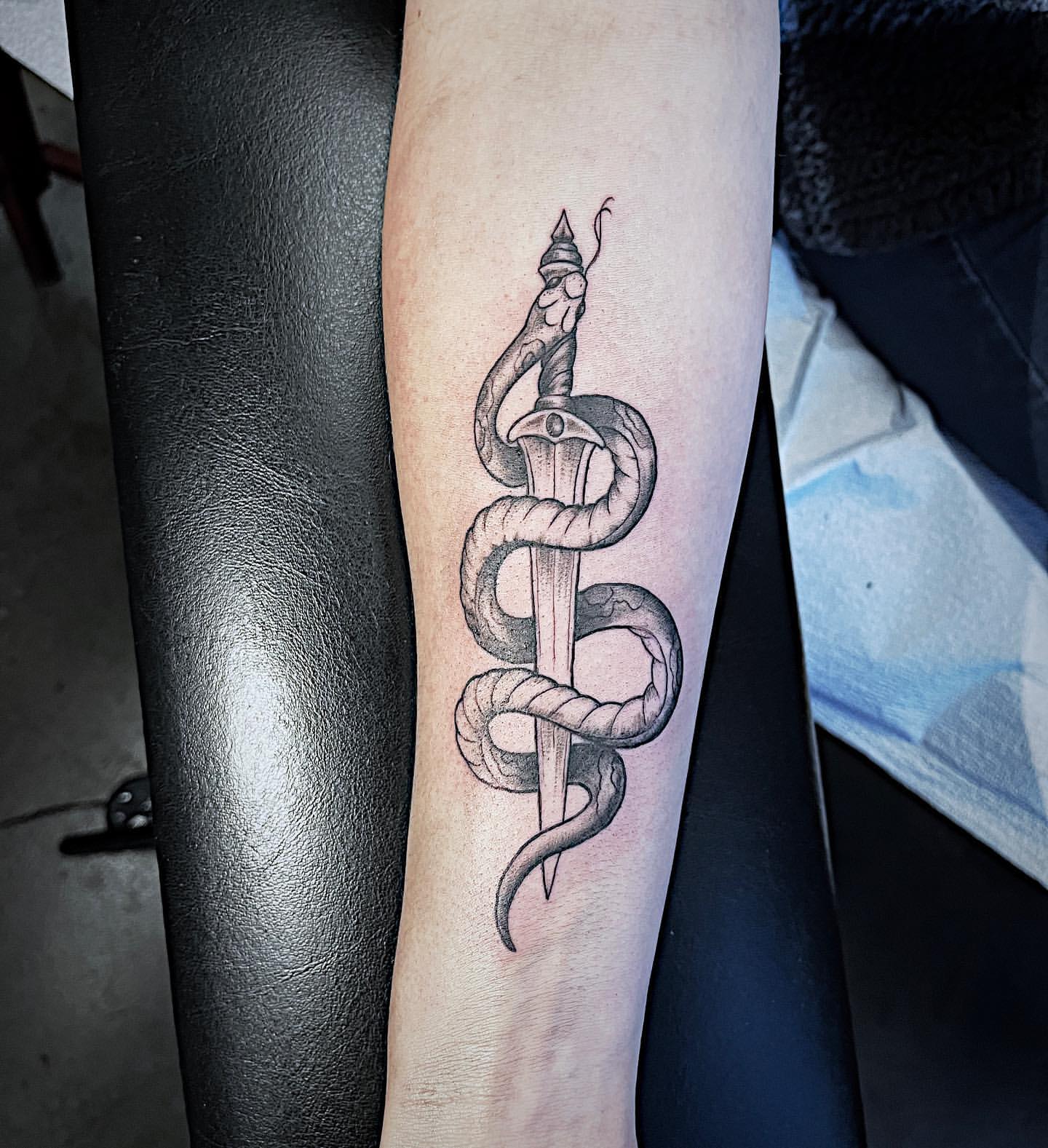 Snake and Sword Tattoo by Tony Honning at Crimson Empire Tattoo in Edmonton Alberta Canada