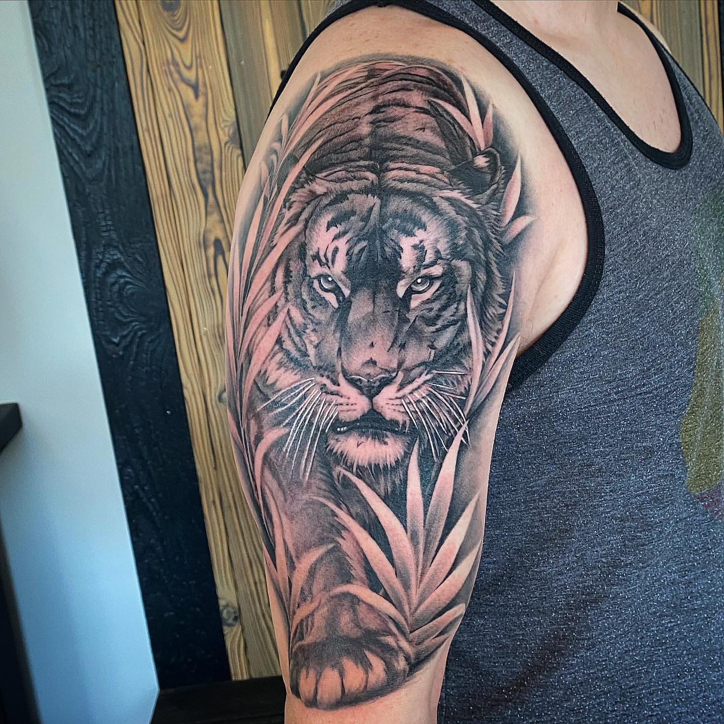Lion Tattoo by Dale Moostoos at Crimson Empire Tattoo in Edmonton Alberta Canada