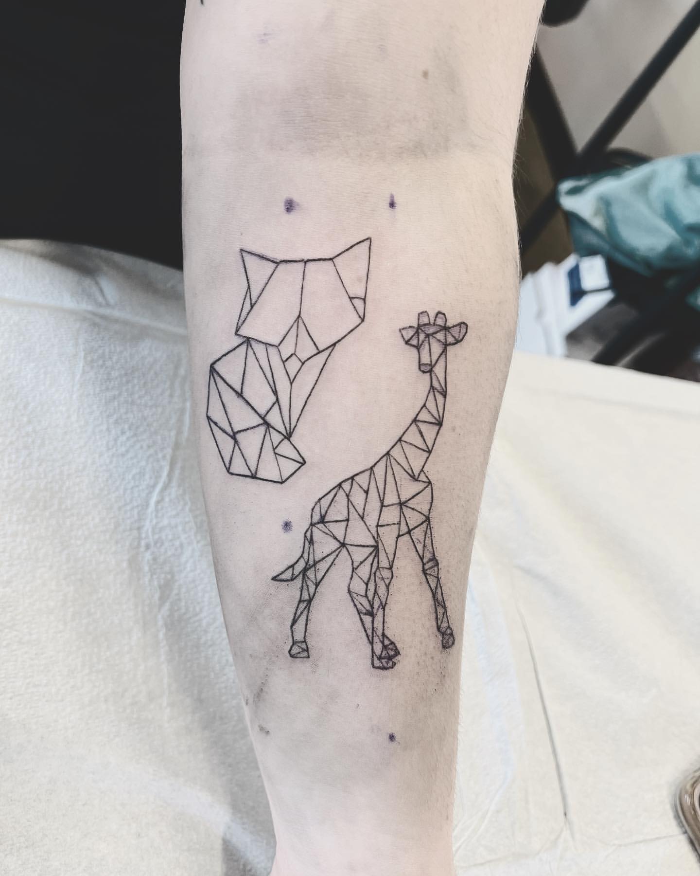 Geometric Fox and Giraffe Tattoo by Vinny Nguyen at Crimson Empire Tattoo in Edmonton Alberta Canada