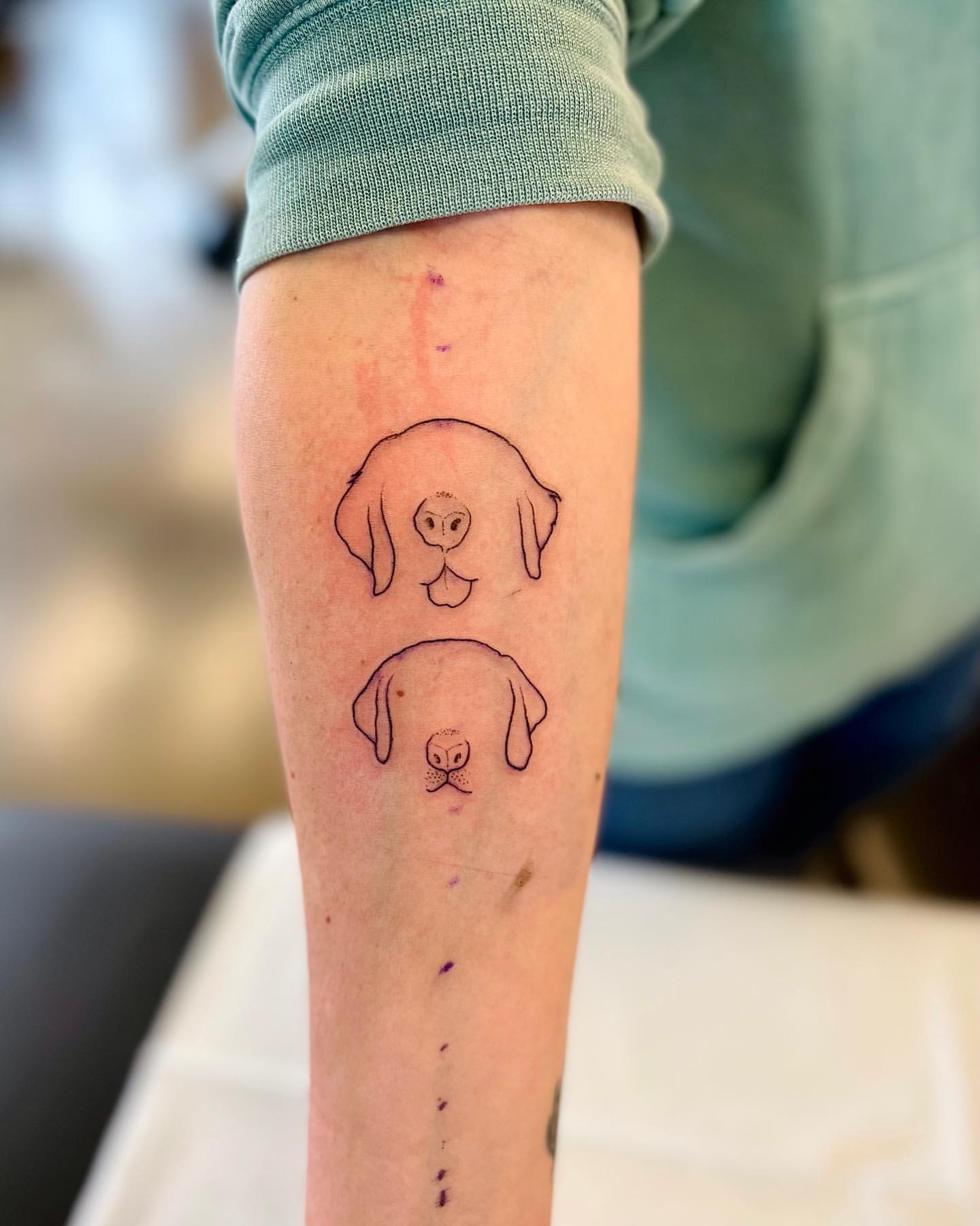 Dog Outlines Tattoo by Vinny Nguyen at Crimson Empire Tattoo in Edmonton Alberta Canada