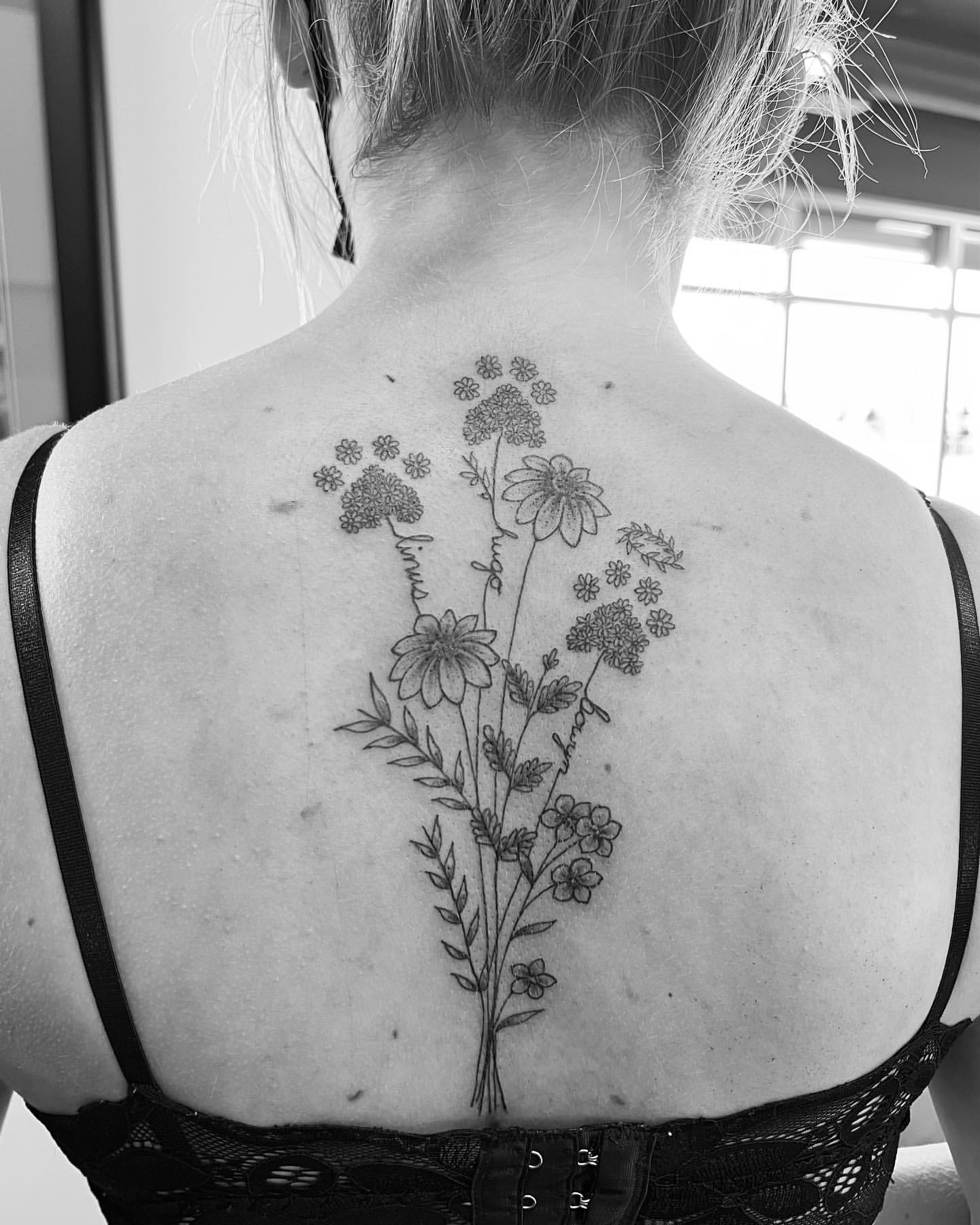 Floral and Paw Print Tattoo by Vinny Nguyen at Crimson Empire Tattoo in Edmonton Alberta Canada