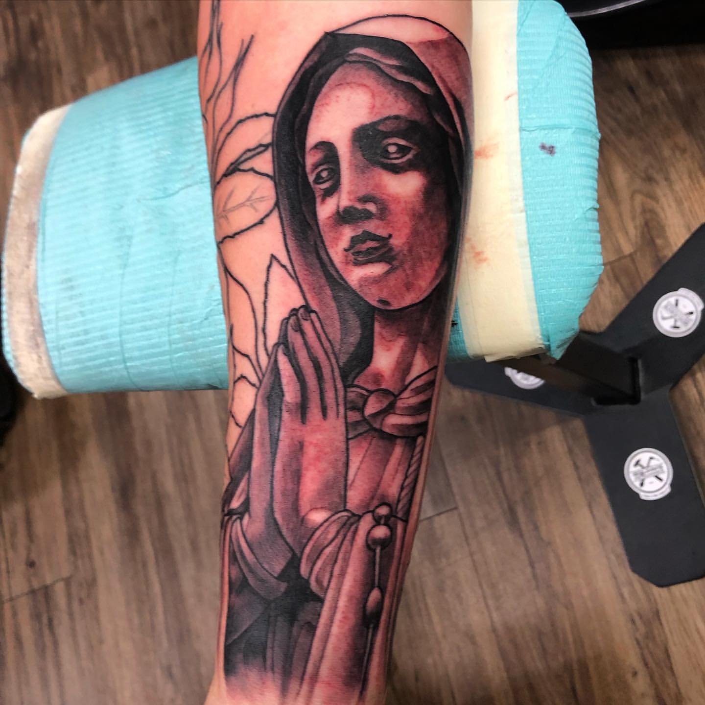 Virgin Mary Statue Tattoo by Trevor Pelletier at Black Gold Tattoo Co in Edmonton Alberta Canada