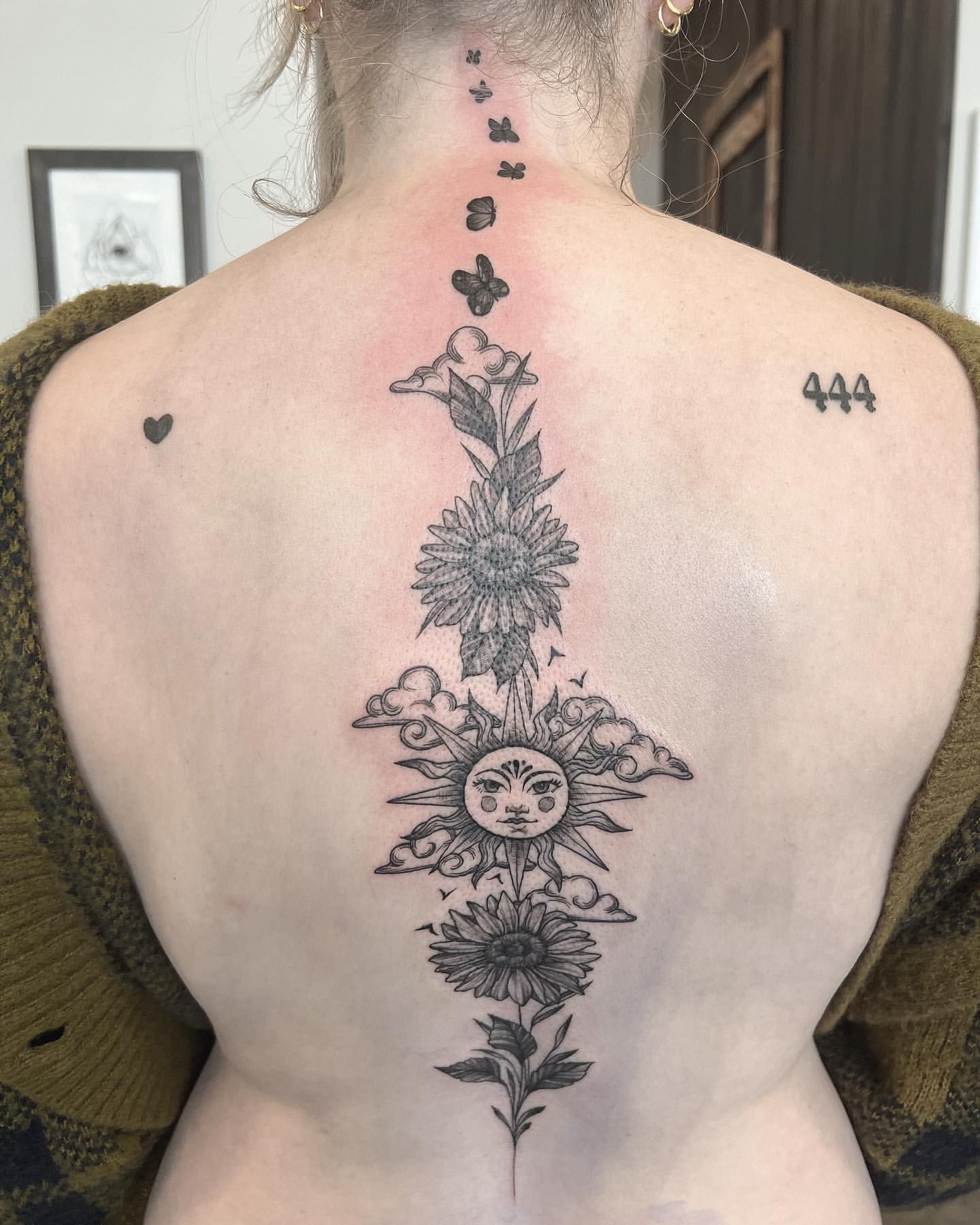 Sun and Floral Tattoo by Adrienne Alexander at Silver Ghost Tattoo in Edmonton Alberta Canada