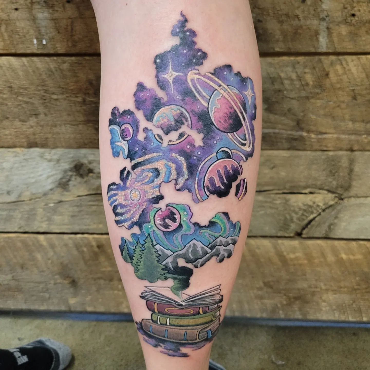 Space Books Tattoo by Sheila Anderson at Crimson Empire Tattoo in Edmonton Alberta Canada