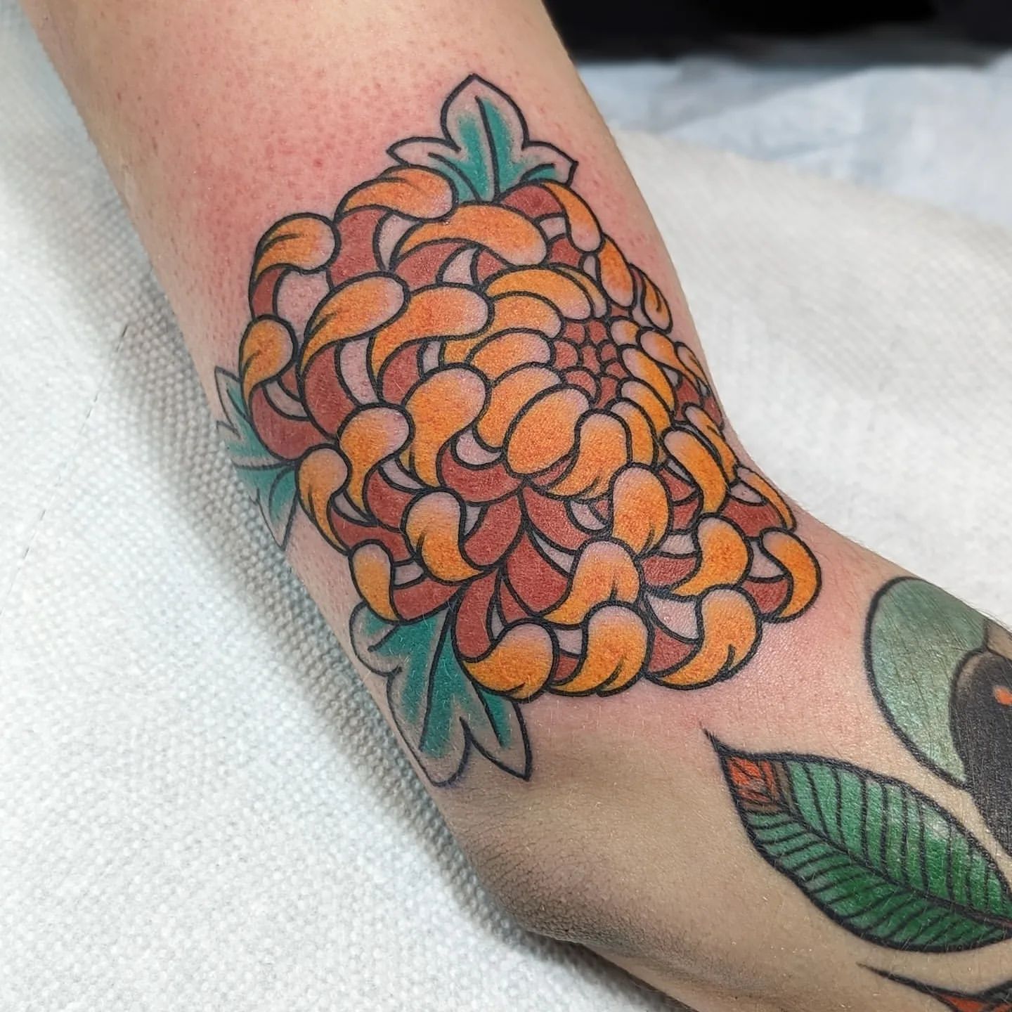 Chrysanthemum Tattoo Chris Benson at Silver Ghost Tattoo in Edmonton Alberta Canada