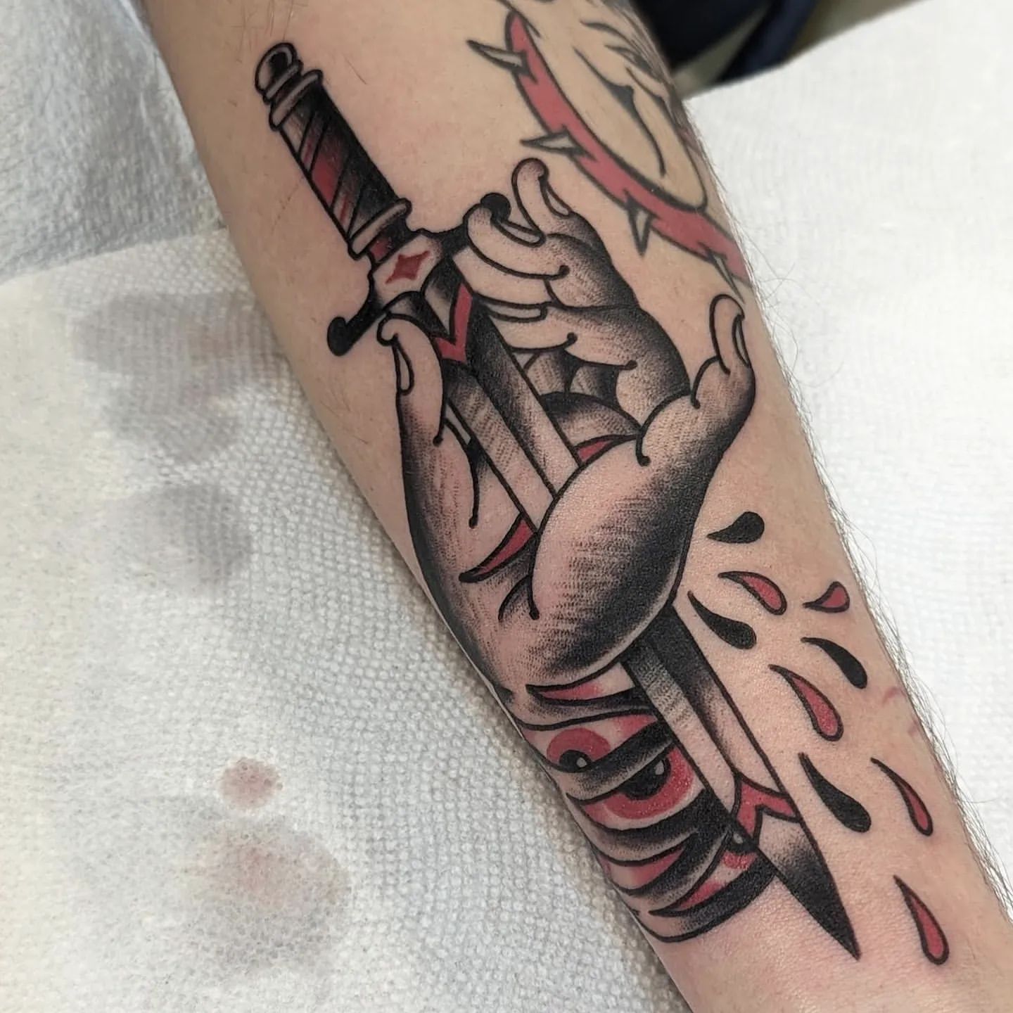 Dagger and Hand Tattoo Chris Benson at Silver Ghost Tattoo in Edmonton Alberta Canada