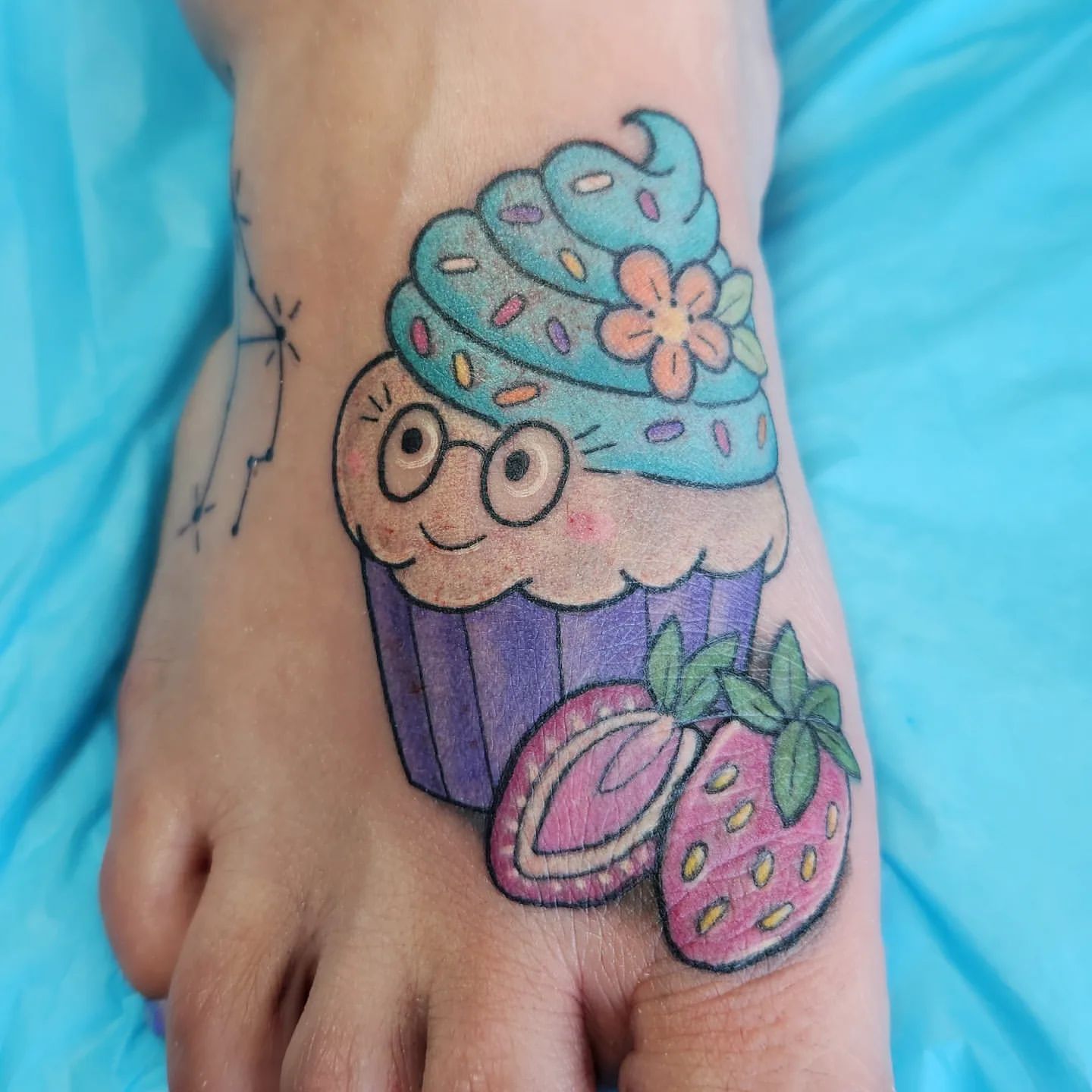 Cupcake Tattoo by Sheila Anderson at Crimson Empire Tattoo in Edmonton Alberta Canada