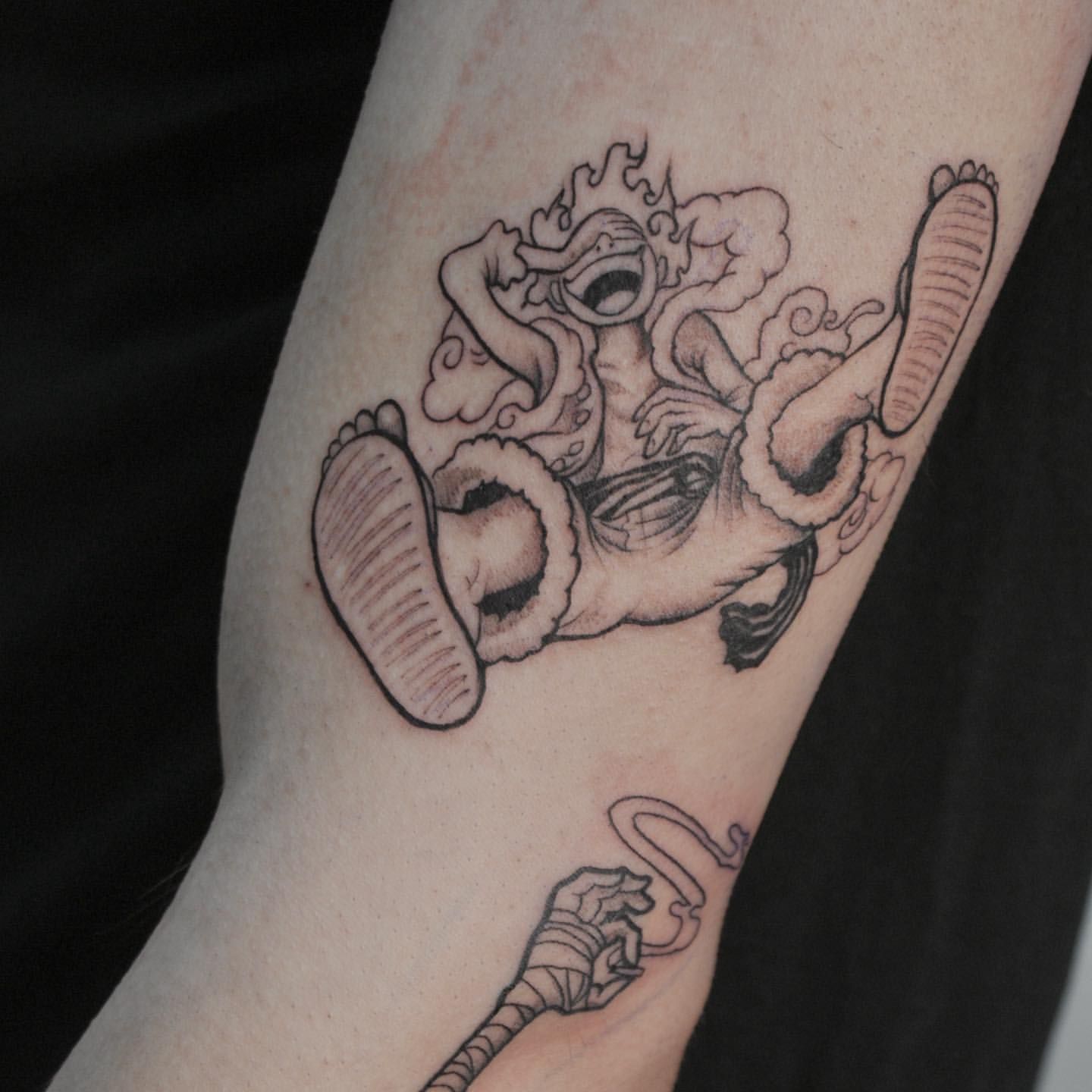 Luffy One Piece Tattoo by Liza Kruk at Silver Ghost Tattoo in Edmonton Alberta Canada