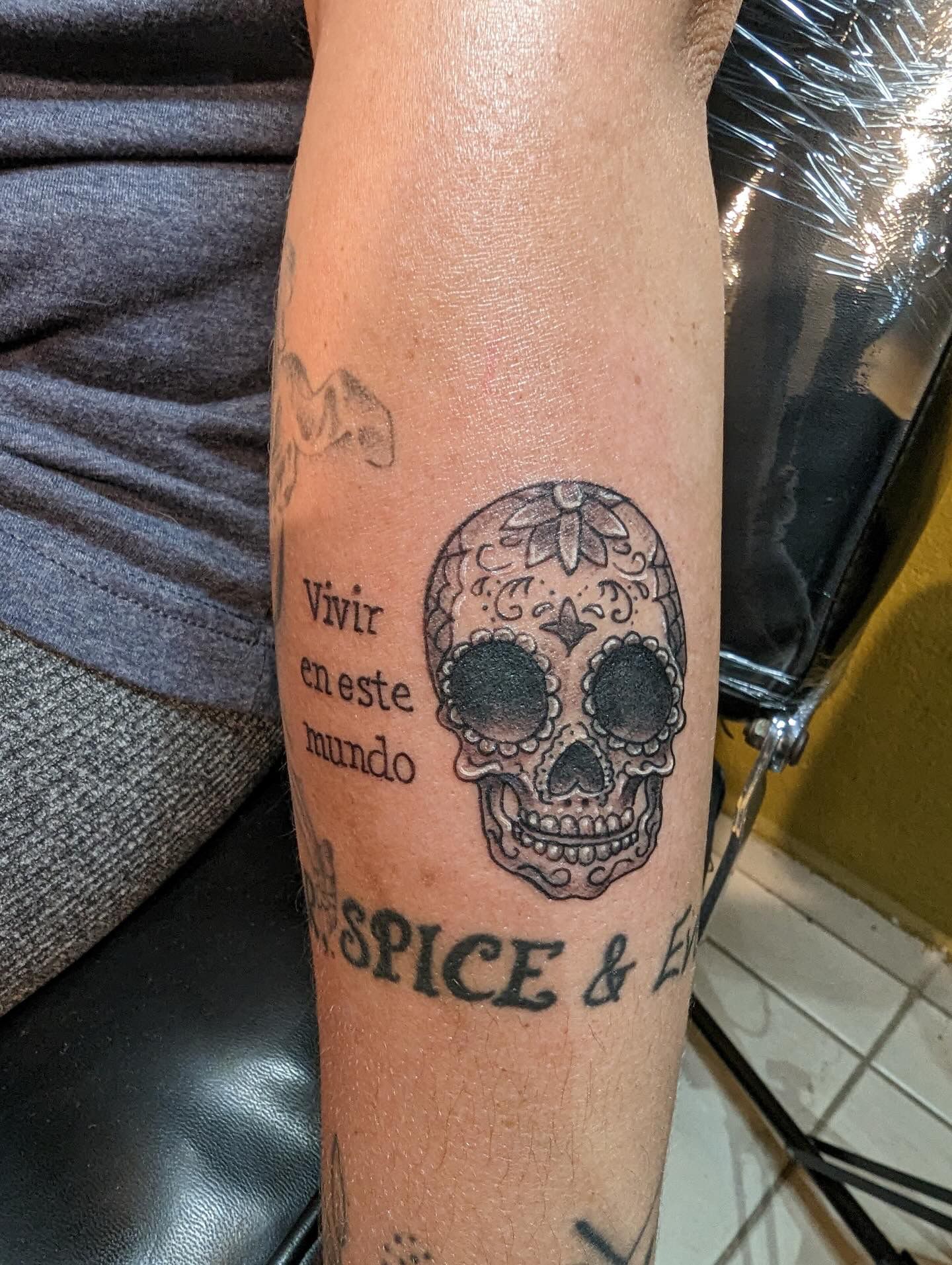 Sugar Skull Tattoo by Sly at Silver Ghost Tattoo in Edmonton Alberta Canada