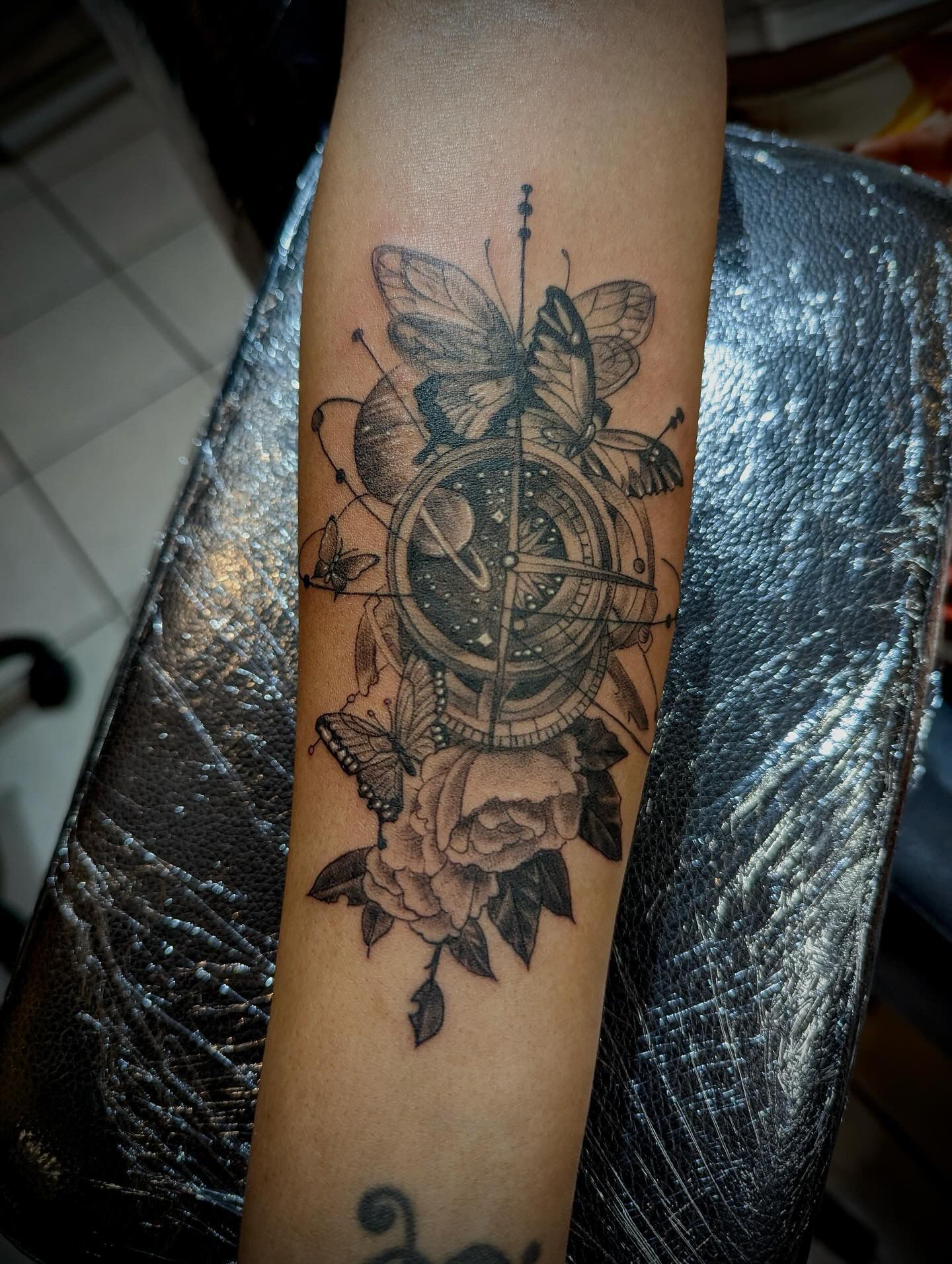 Compass, Floral and Butterflies Tattoo by Sly at Silver Ghost Tattoo in Edmonton Alberta Canada