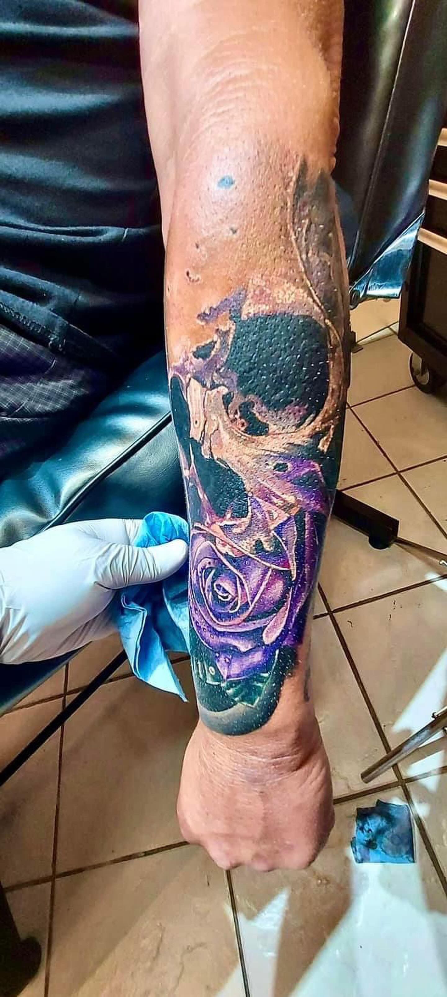 Skull and Rose Tattoo by Sly at Silver Ghost Tattoo in Edmonton Alberta Canada