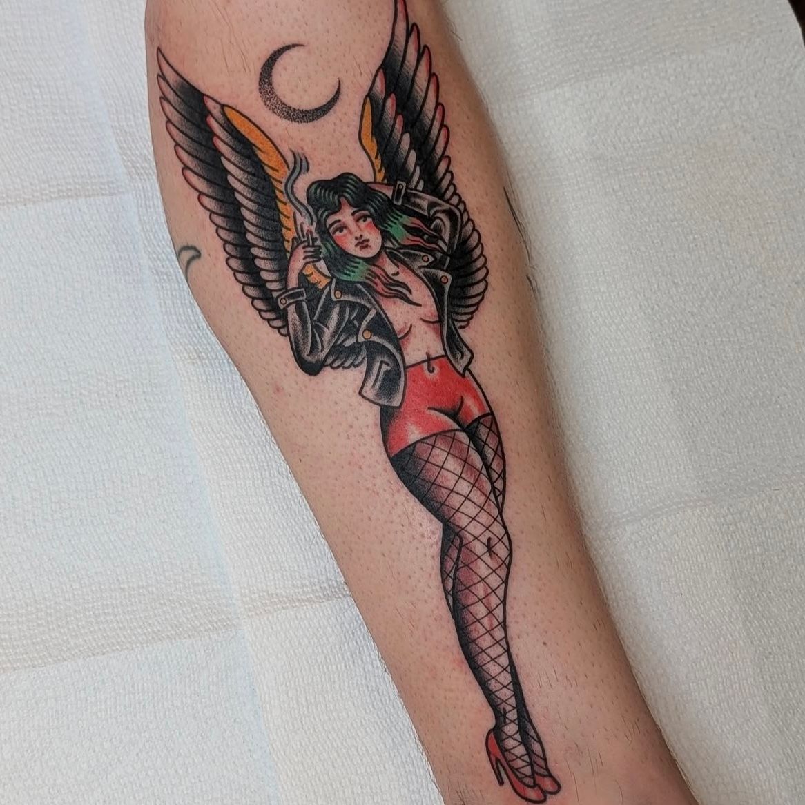 Pin Up Tattoo by Chris Benson at Silver Ghost Tattoo in Edmonton Alberta Canada