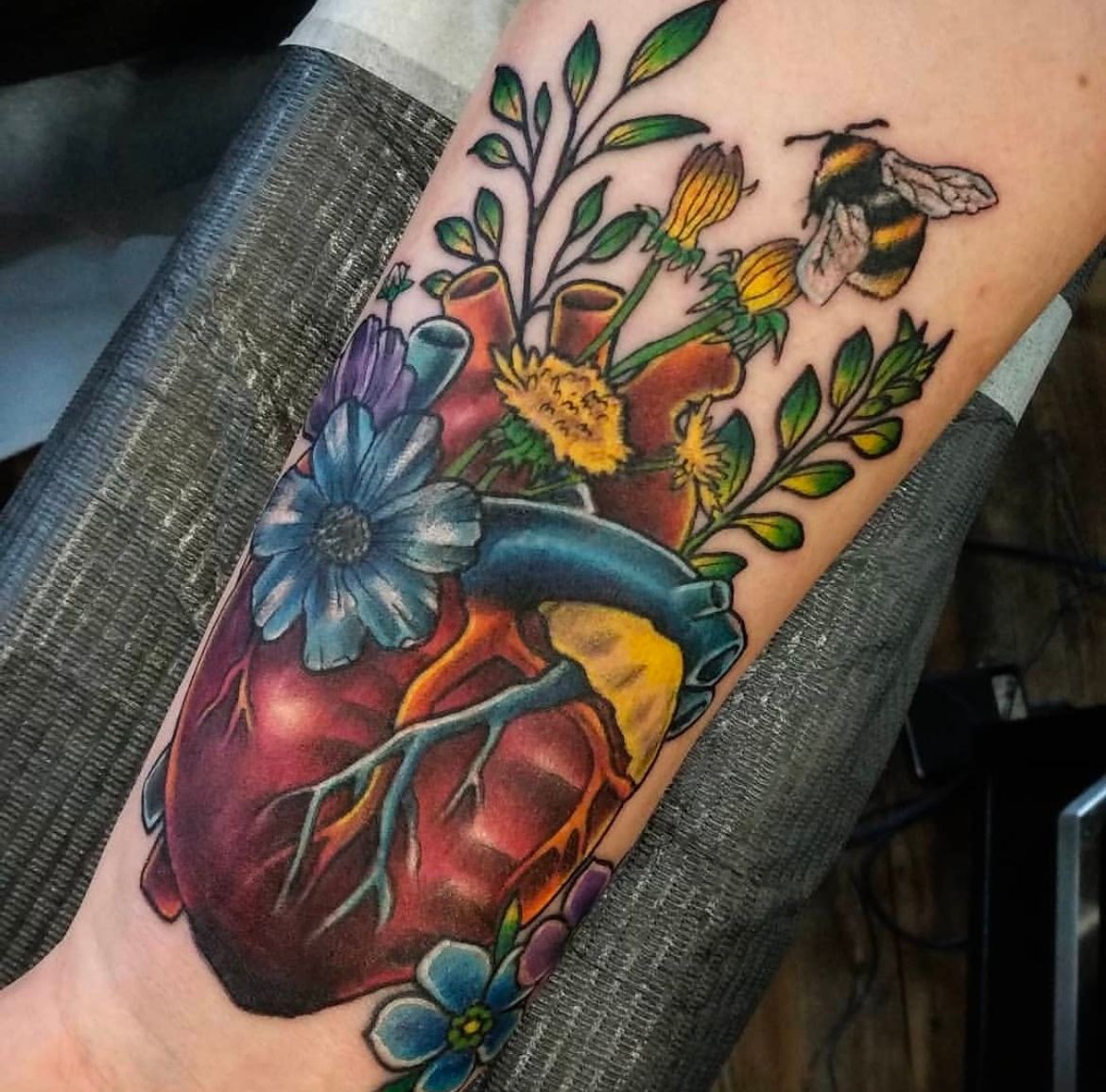 Anatomical Heart and Floral Tattoo by Toby Shipman at Silver Ghost Tattoo in Edmonton Alberta Canada