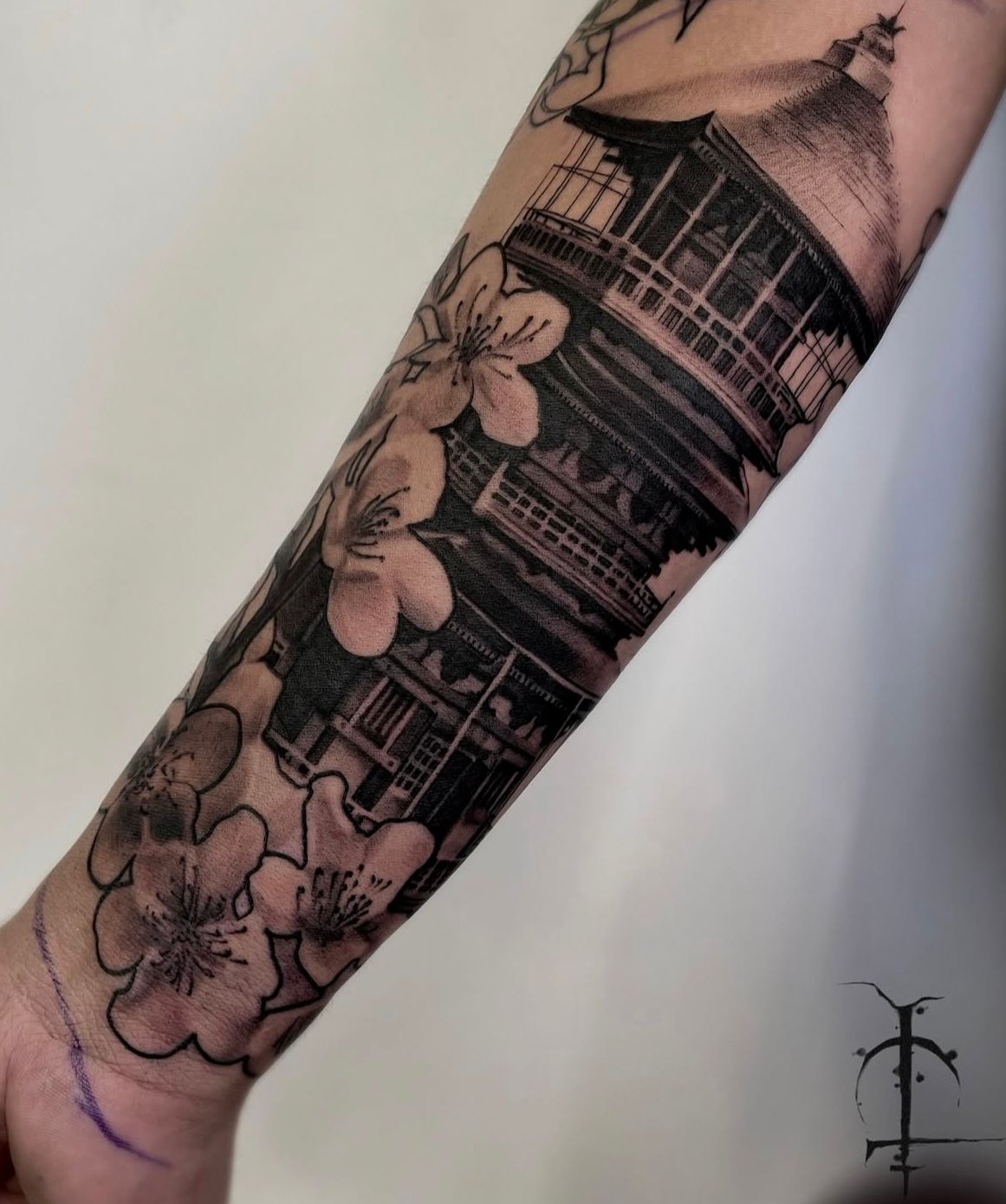 Pagoda and Cherry Blossoms Tattoo by Val at Silver Ghost Tattoo in Edmonton Alberta Canada