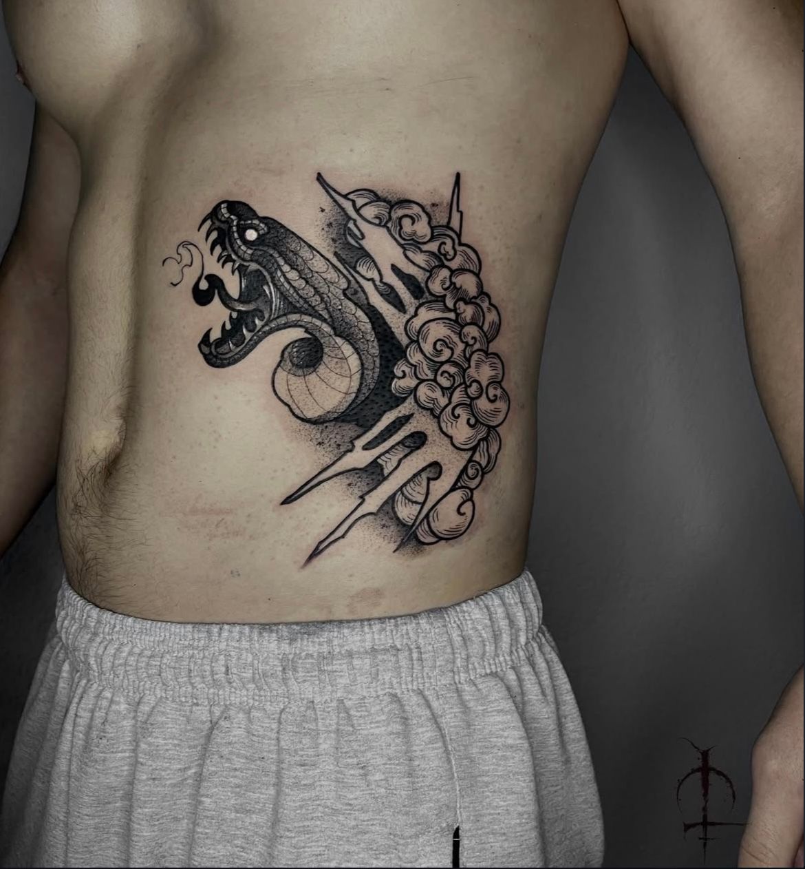 Snake Tattoo by Val at Silver Ghost Tattoo in Edmonton Alberta Canada