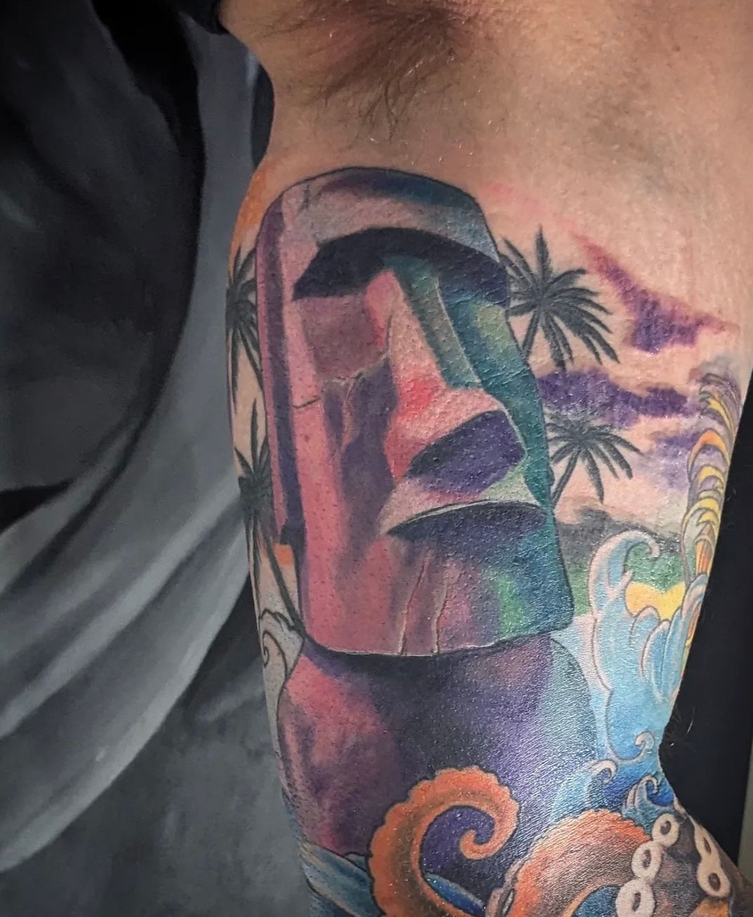 Easter Island Statue Tattoo by Toby Shipman at Silver Ghost Tattoo in Edmonton Alberta Canada