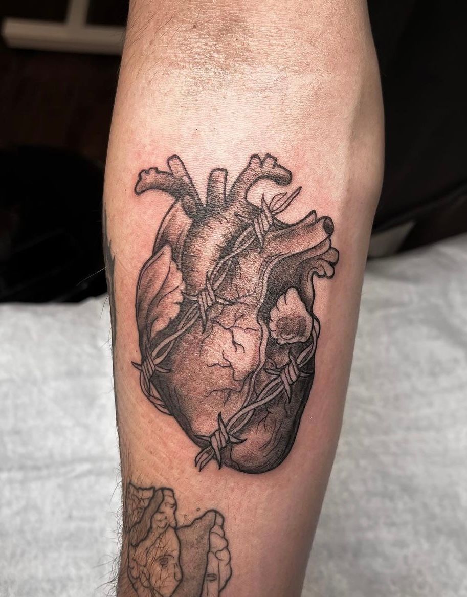 Heart Tattoo by Tony Honning at Silver Ghost Tattoo in Edmonton Alberta Canada