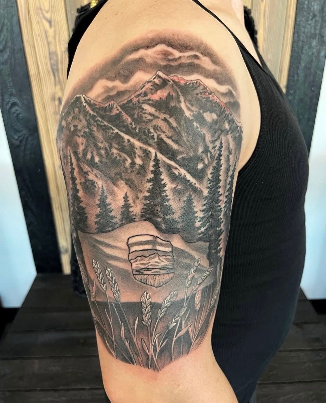 Albertan Mountain Tattoo by Chad Lavers at Crimson Empire Tattoo in Edmonton Alberta Canada