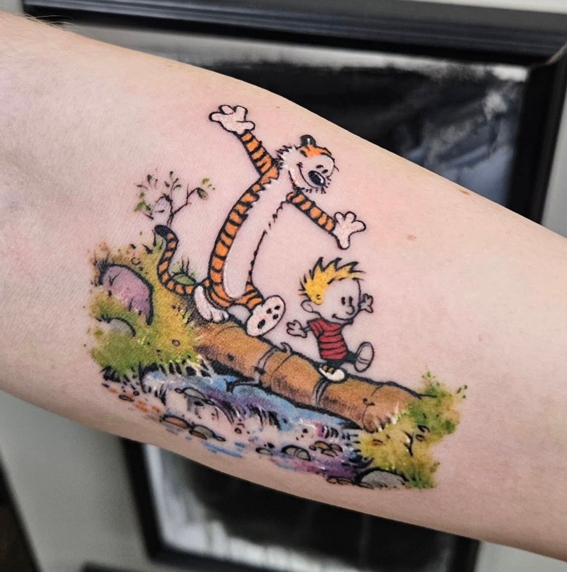 Calvin and Hobbs Tattoo by Ian Wang at Black Gold Tattoo Co in Edmonton Alberta Canada