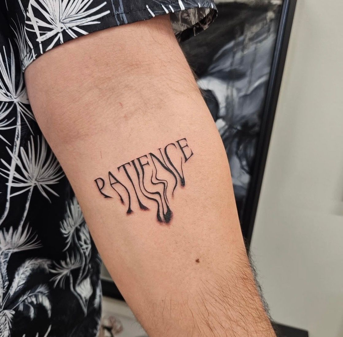 Melty Writing Tattoo by Ian Wang at Black Gold Tattoo Co in Edmonton Alberta Canada