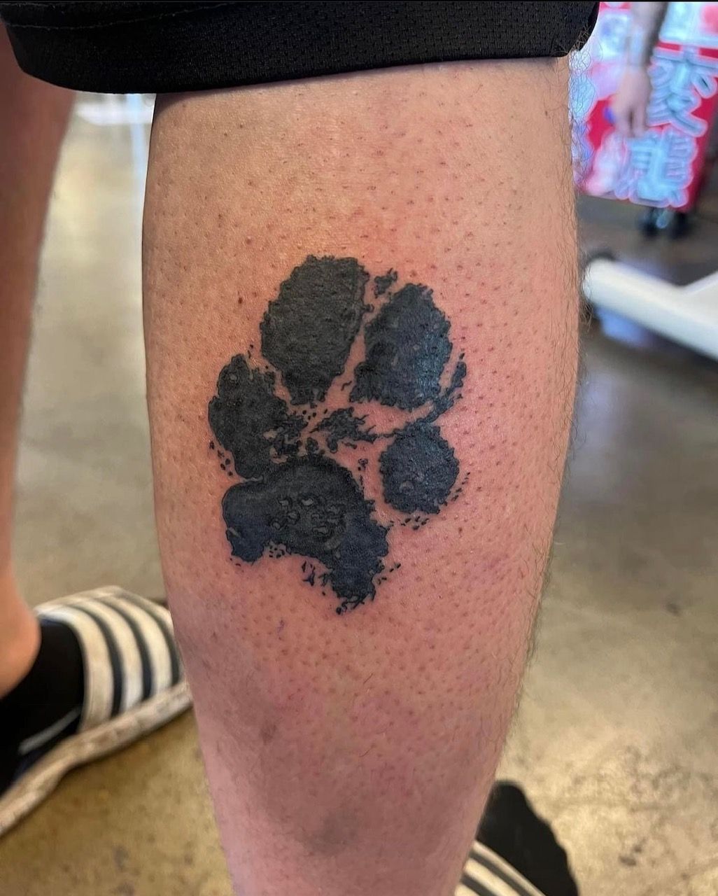 Paw Print Tattoo by Keon Courtney at Crimson Empire Tattoo in Edmonton Alberta Canada