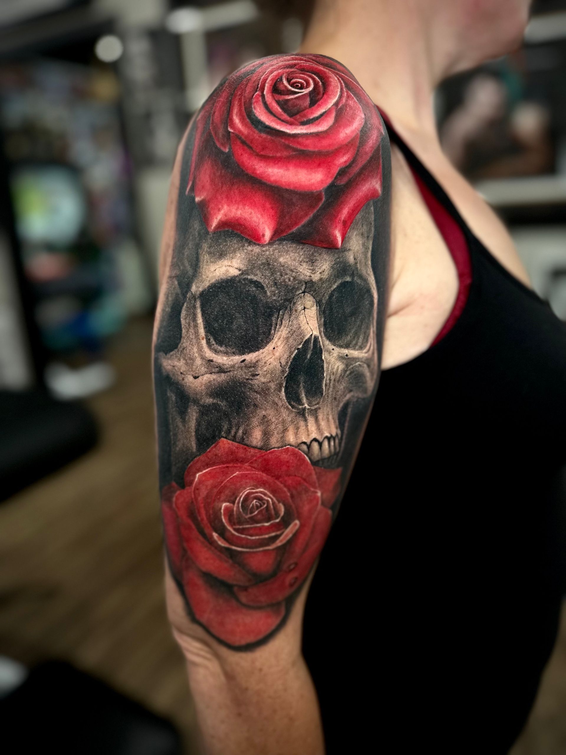 Skull and Roses Tattoo by Jackson Sukhov at Black Gold Tattoo Co in Edmonton Alberta Canada