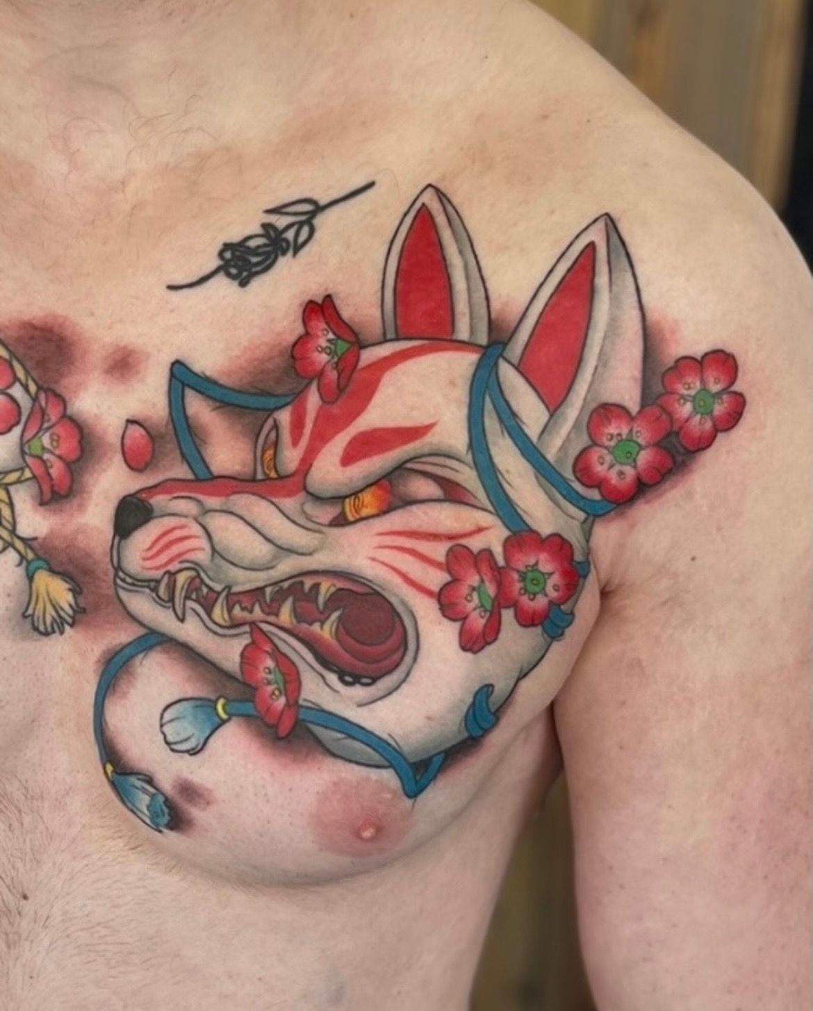 Kitsune Chest Panel Tattoo by Curt Semeniuk at Crimson Empire Tattoo in Edmonton Alberta Canada