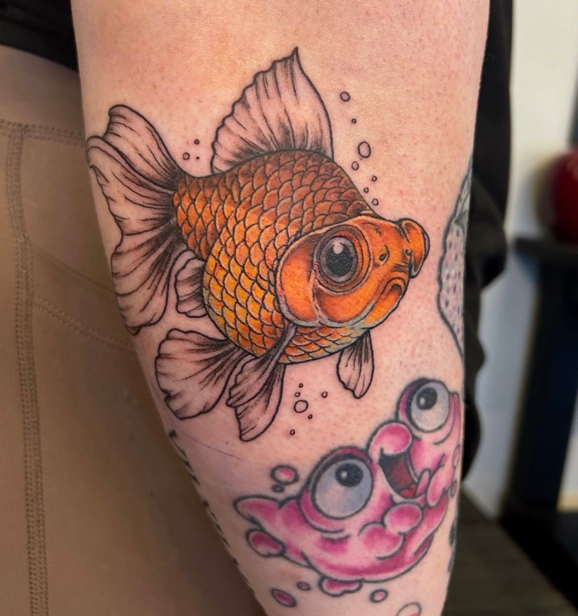 Goldfish Tattoo by Vinny Nguyen at Crimson Empire Tattoo in Edmonton Alberta Canada