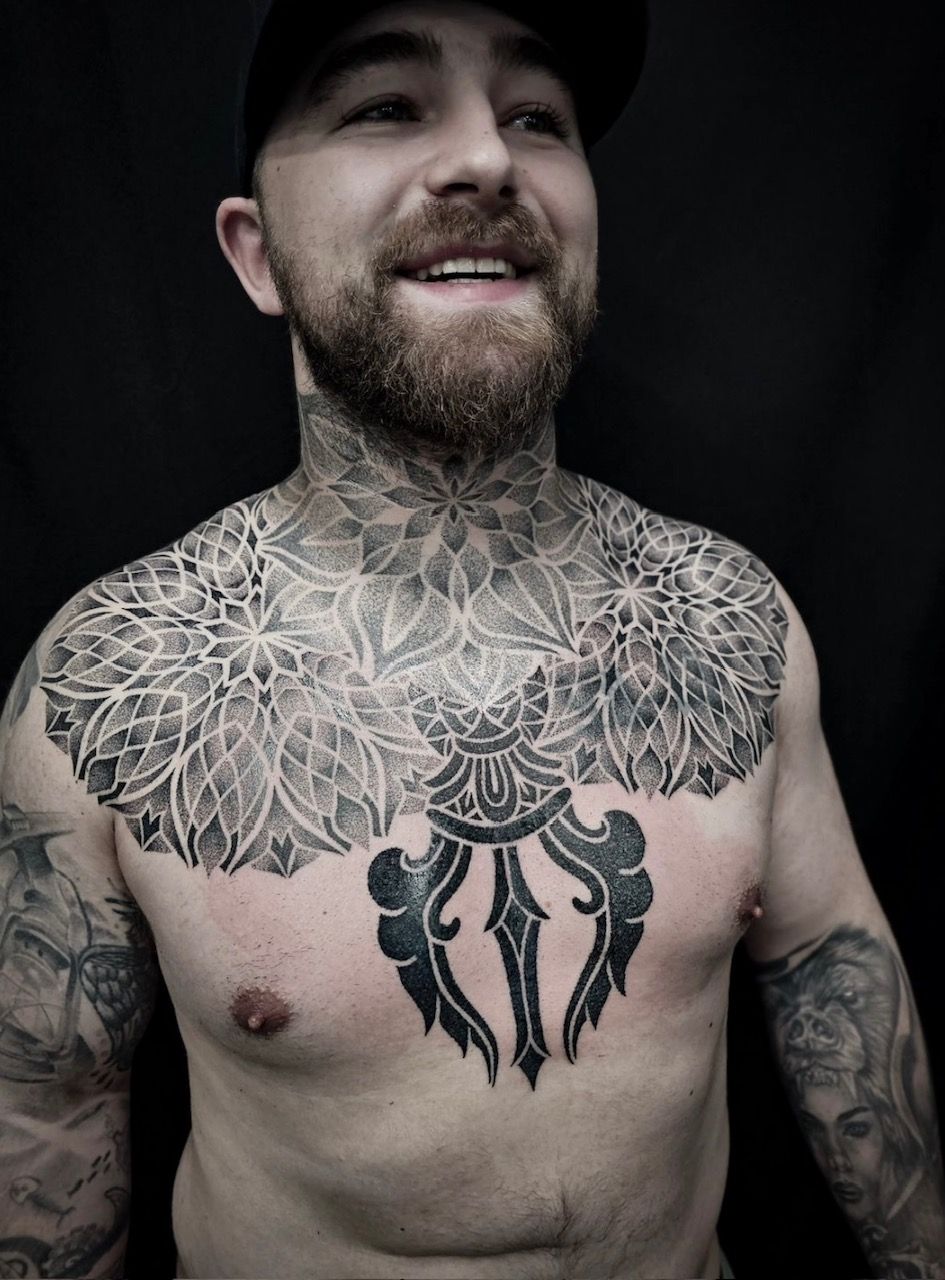 Geometric Dotwork Chest Tattoo by Alex Arnautov at Black Gold Tattoo Co in Edmonton Alberta Canada