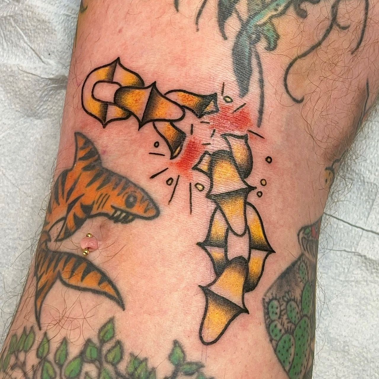 Broken Chain Tattoo by Tony Honning at Silver Ghost Tattoo in Edmonton Alberta Canada