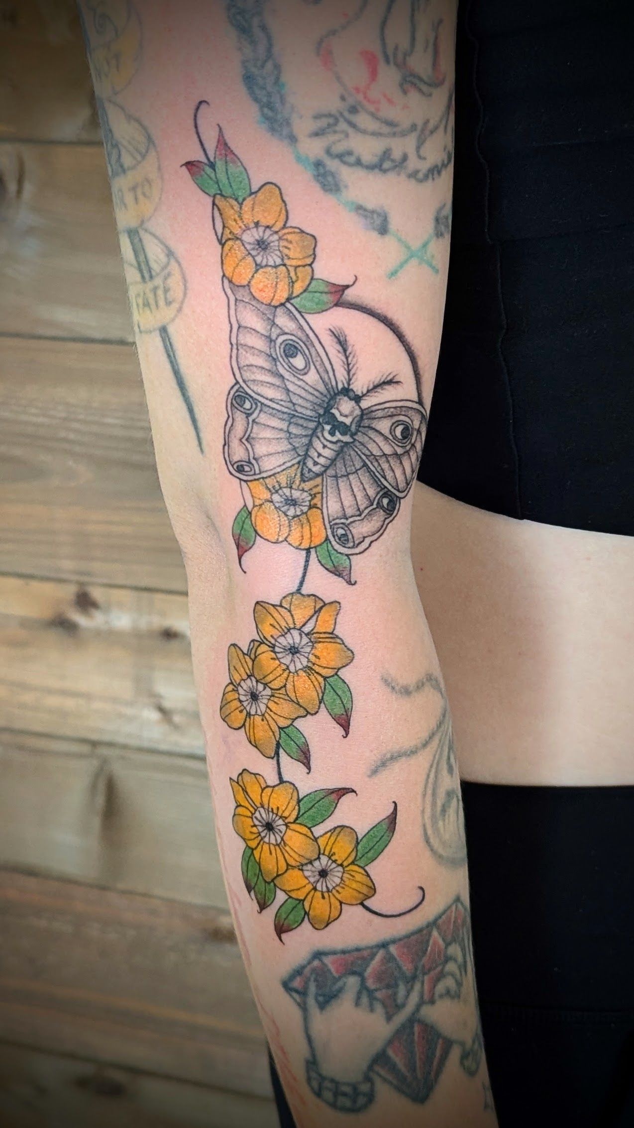 Moth and Floral Tattoo by Samantha Hnatiw at Crimson Empire Tattoo in Edmonton Alberta Canada