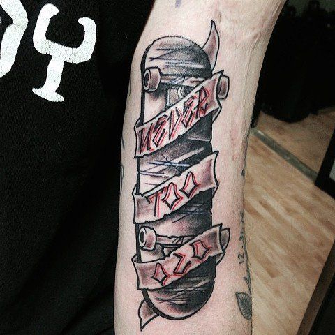 Skateboard Tattoo by Trevor Pelletier at Black Gold Tattoo Co in Edmonton Alberta Canada