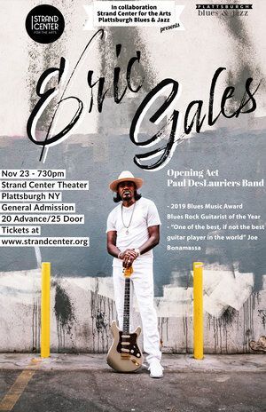 a poster of Eric Gales wearing a hat, dressed in white and holding a guitar in a parking lot.