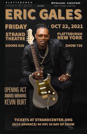 A poster of Eric gales sitting on a stage holding a guitar.