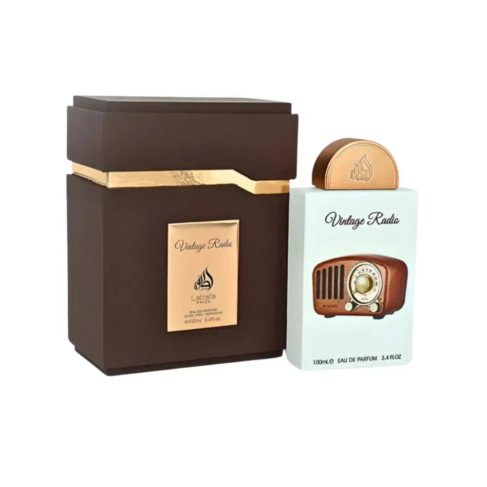 Caja de regalo marrón y frasco de perfume a juego de estilo vintage con detalles dorados.