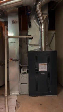 There is a furnace in the basement of a house.