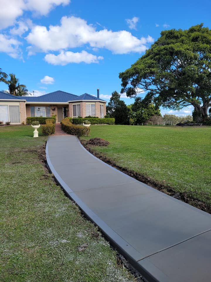 Concrete Pathways to a House — Kempsey Concrete Contractors In Kempsey, NSW