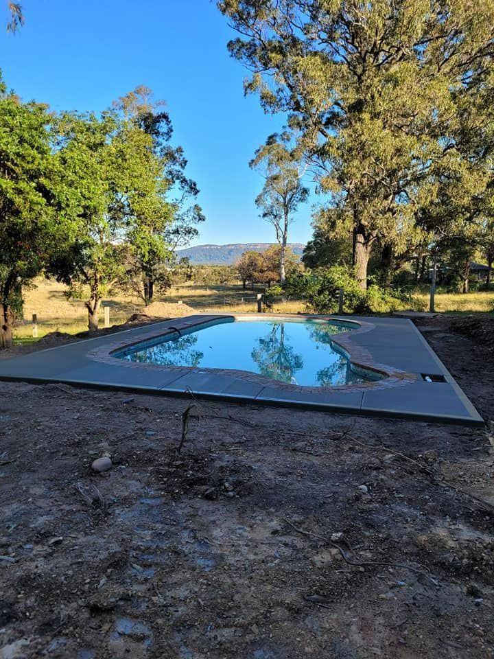 Concrete Deck Around the Pool — Kempsey Concrete Contractors In Kempsey, NSW