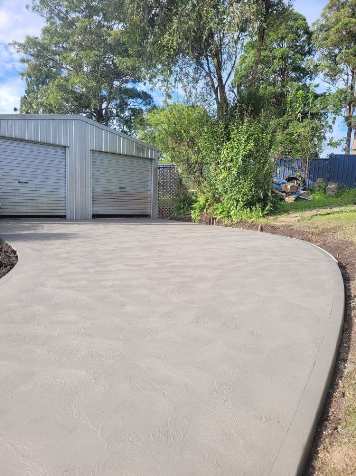 Garage With Concrete Driveway — Kempsey Concrete Contractors In Kempsey, NSW